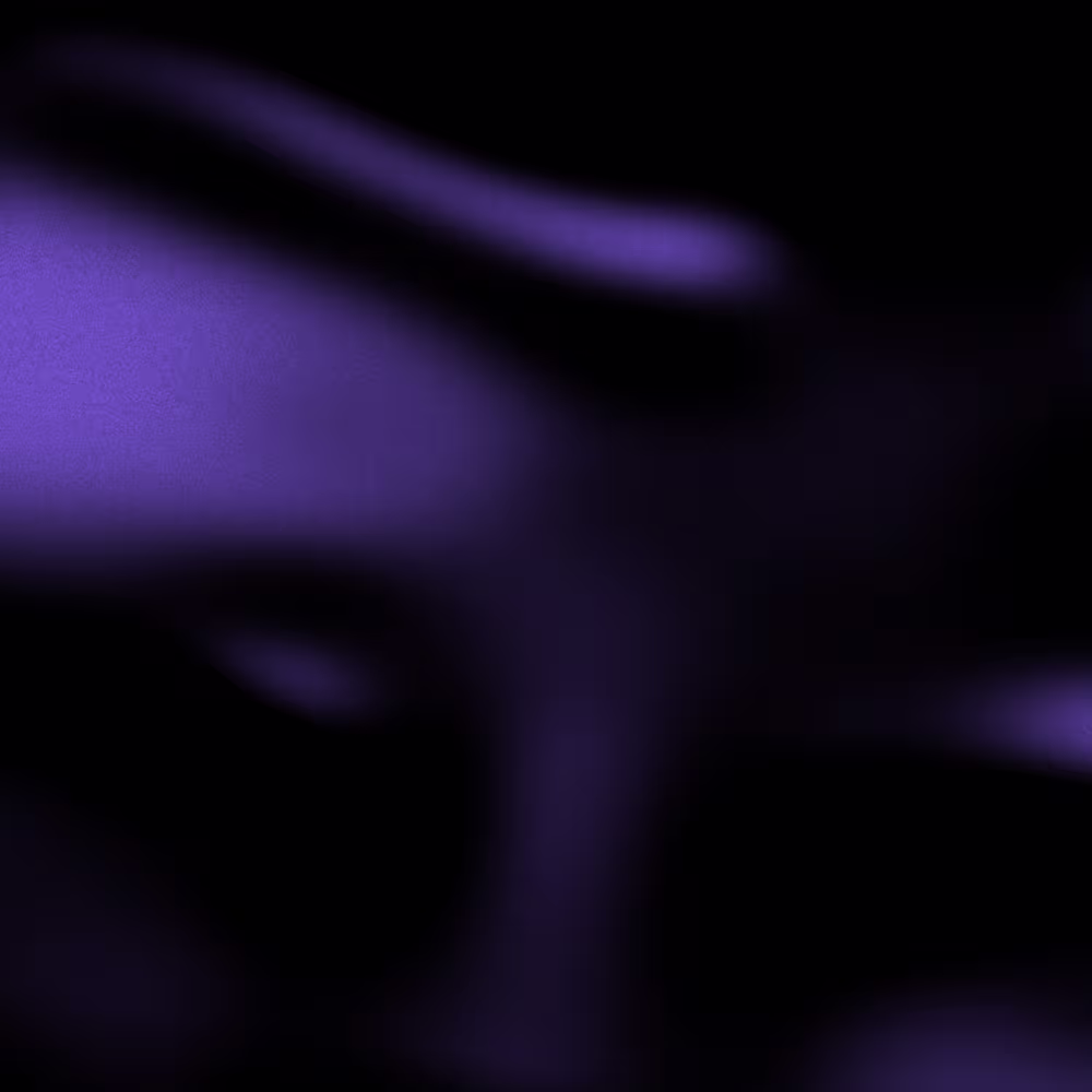 A gradient image transitioning from dark black to light gray tones.